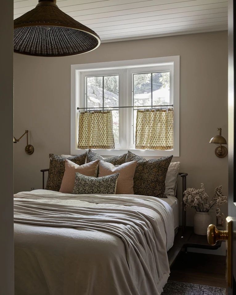 farmhouse bedroom cafe curtains over the bed