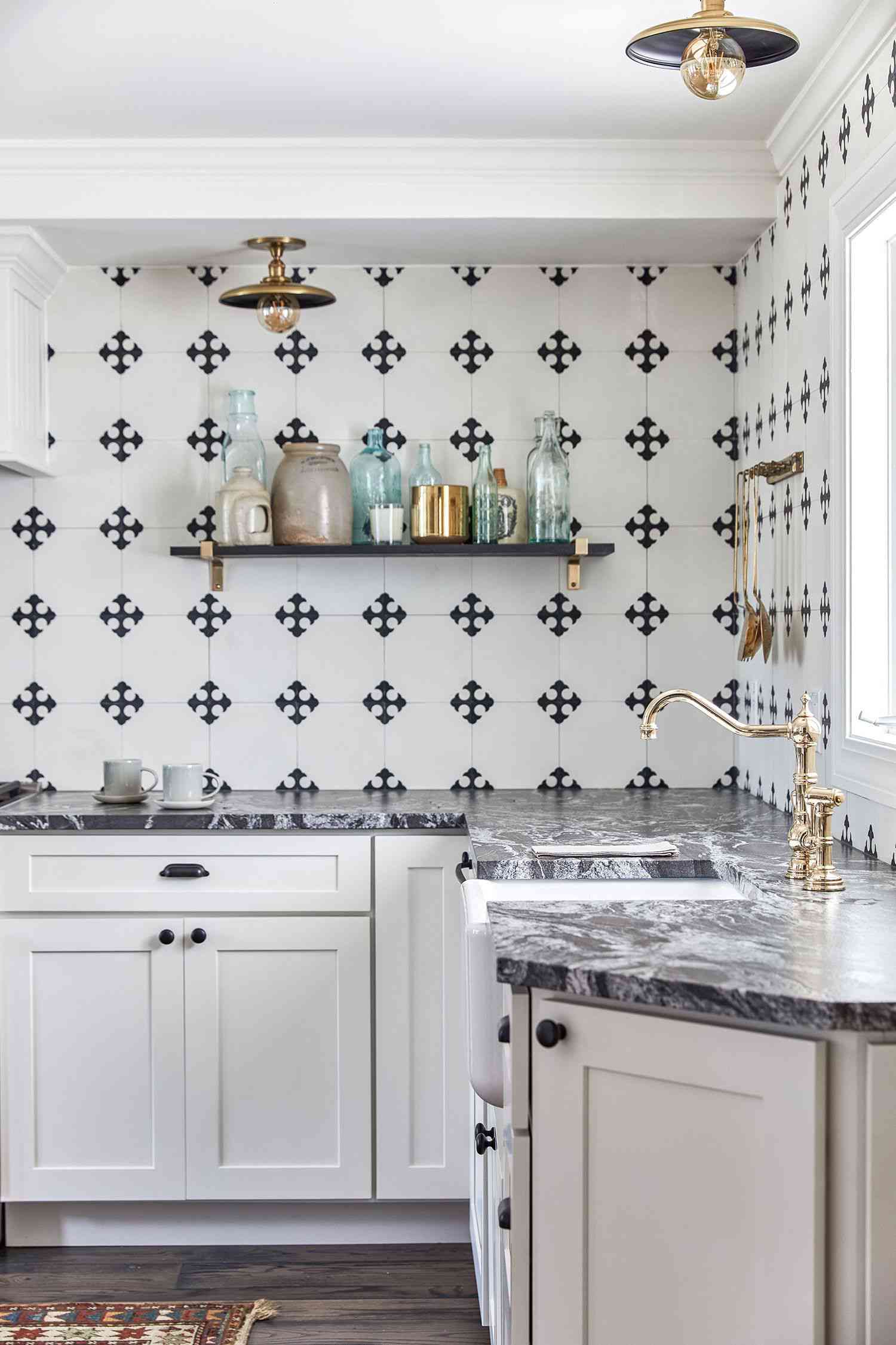 black marble countertops with white shaker cabinets