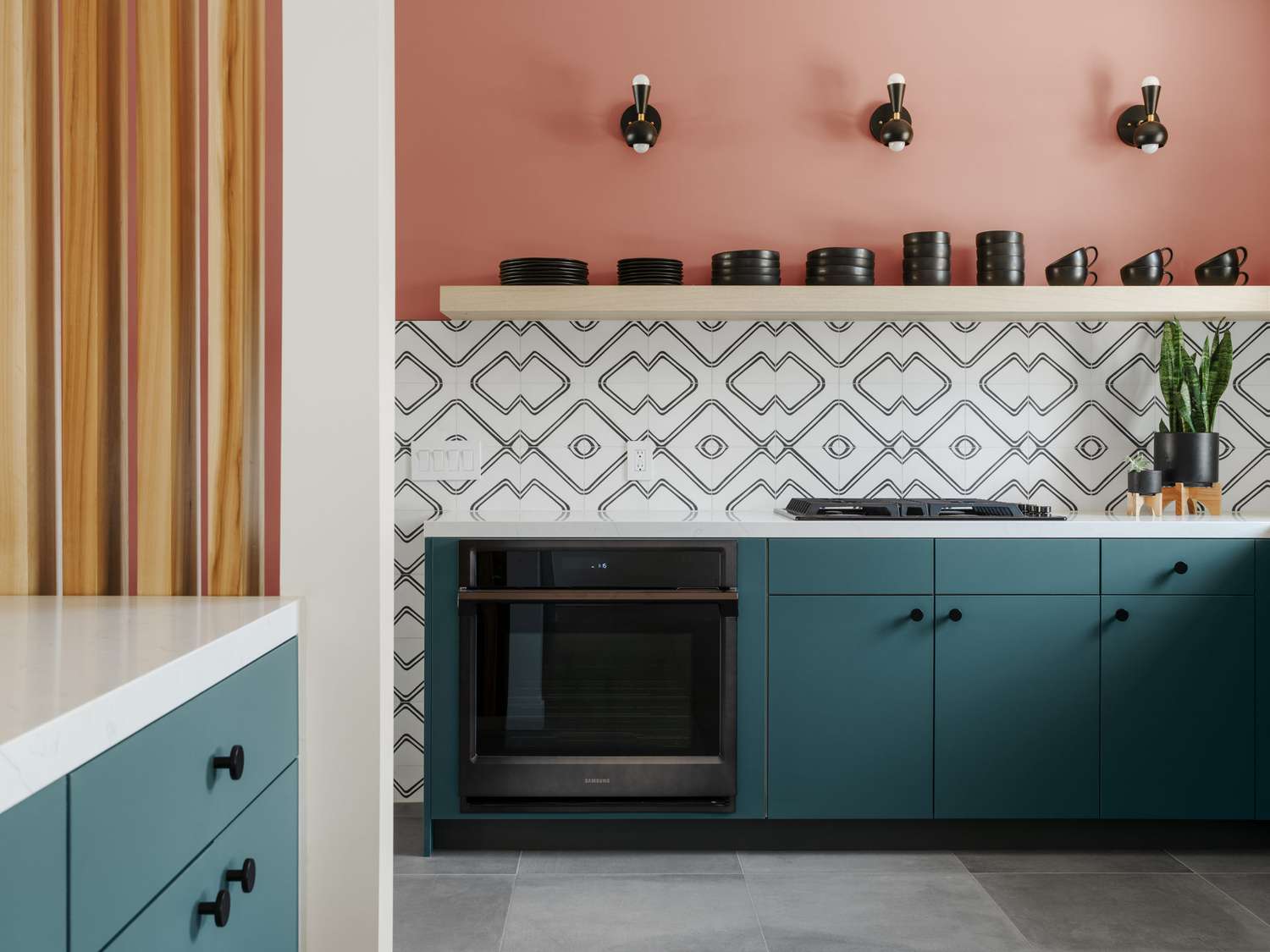 kitchen with row of sconce lighting