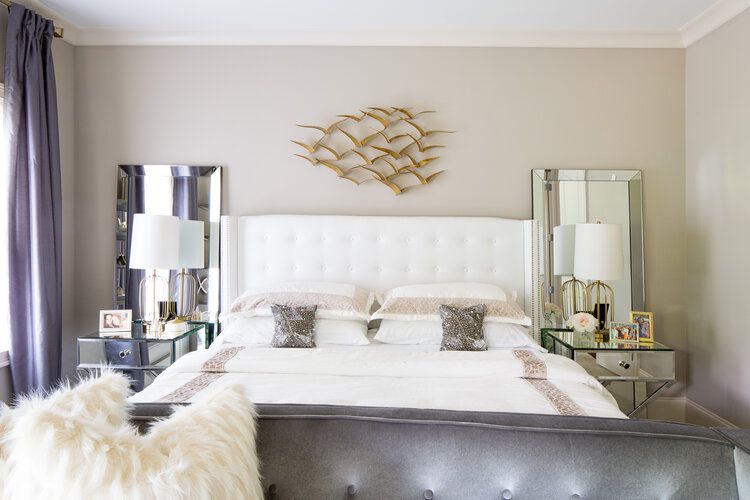 decorating with midcentury modern wall art over bed