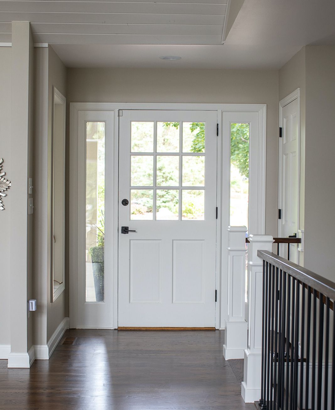 Entryway with subtle pot lights.