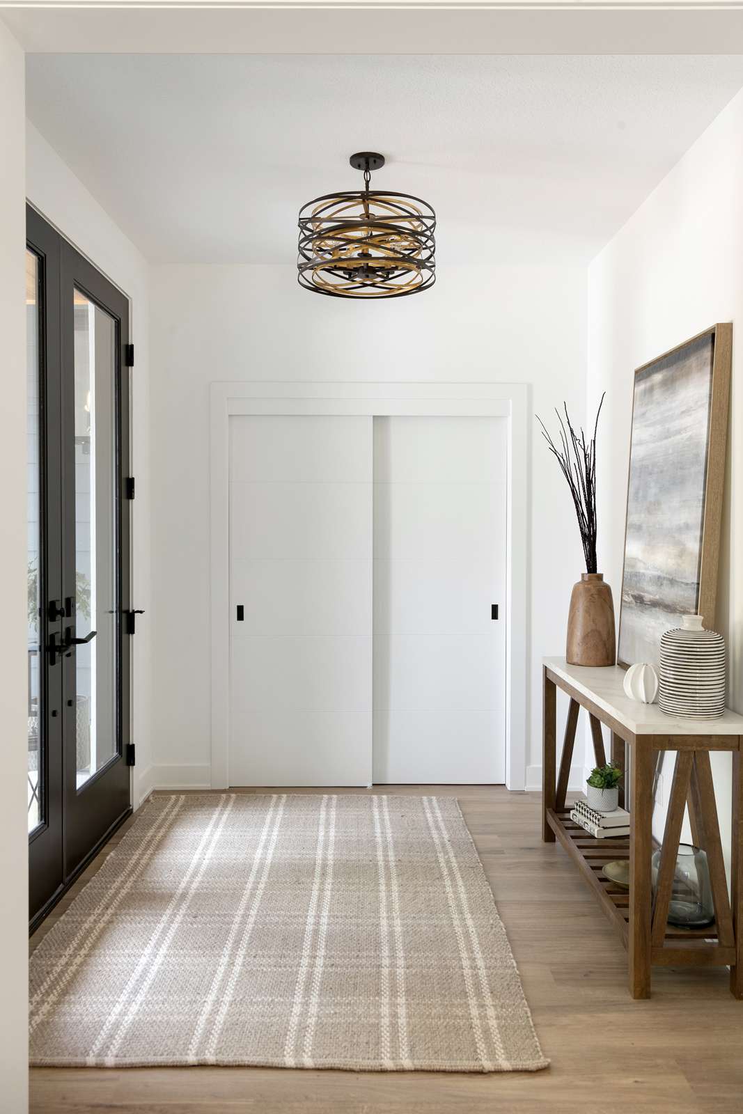 Entryway with multi-colored fixture.