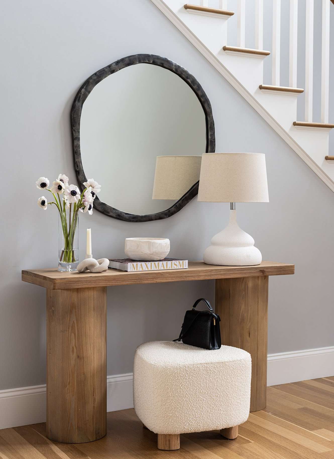 Entryway with table lamp and mirror combo.