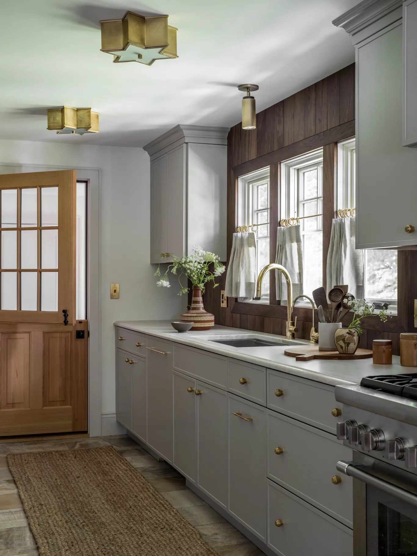 light gray kitchen with dark wood accents