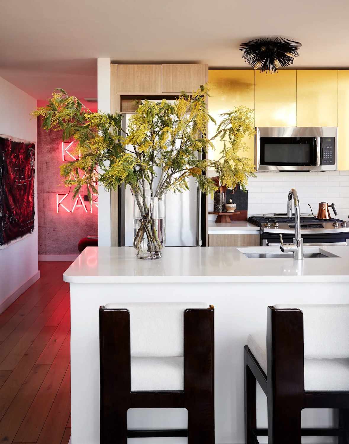 white kitchen countertops with gold cabinets