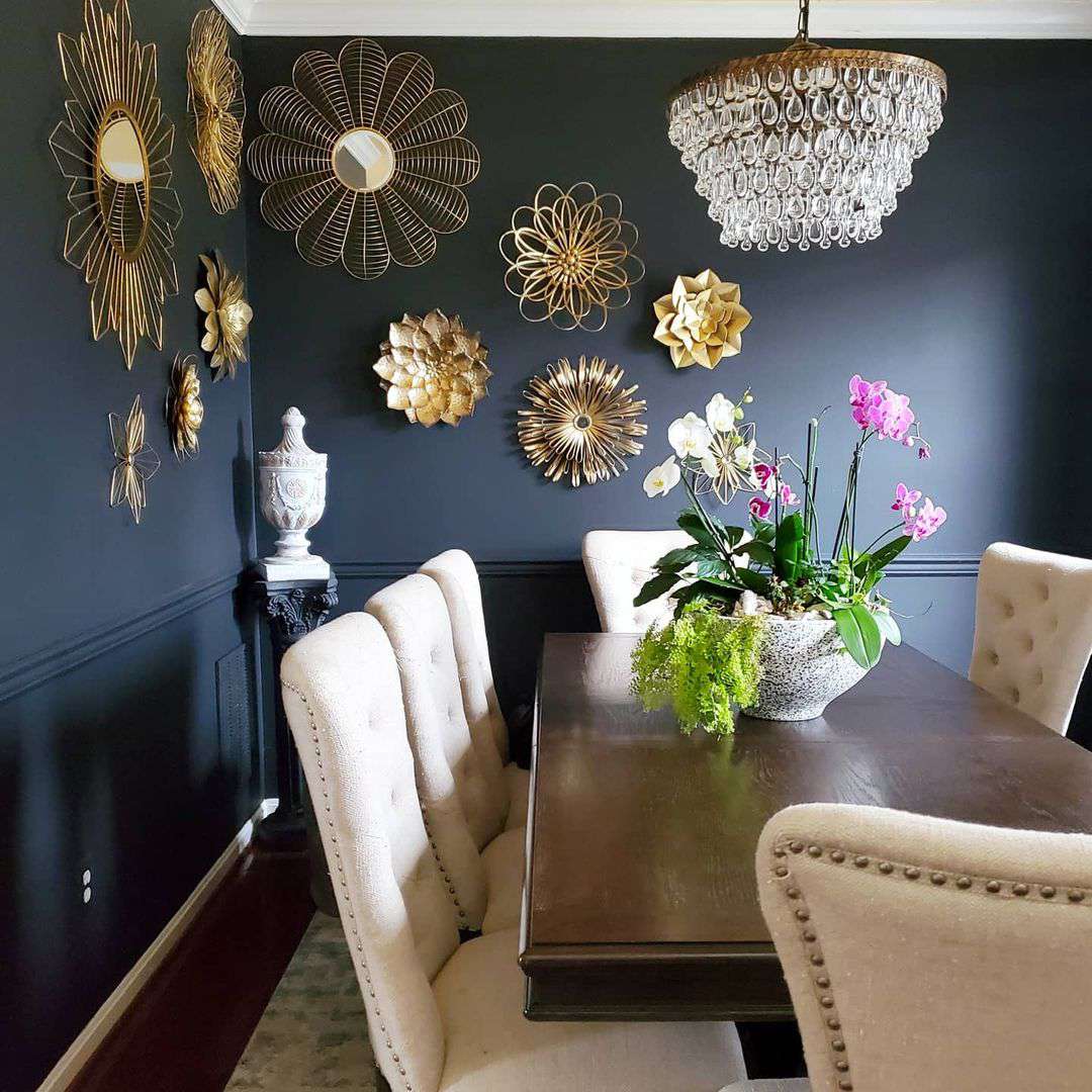 black dining room with gold