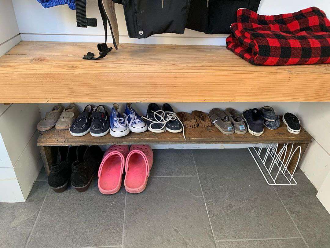 A shoe shelf made from scrap wood