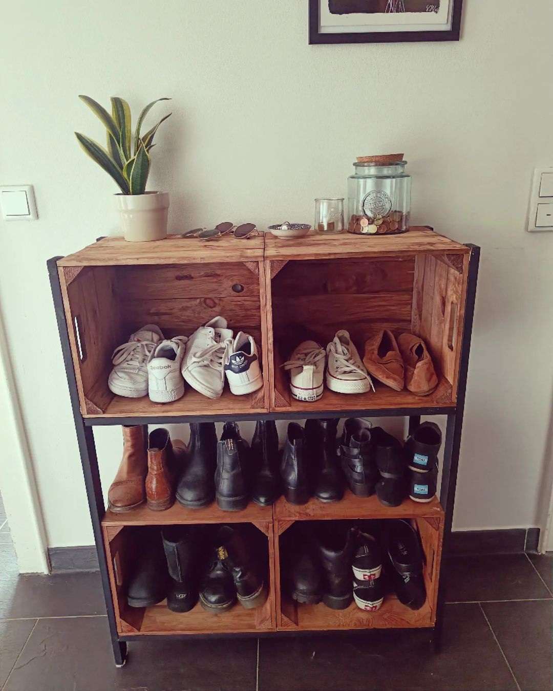 A DIY shoe shelf made from stacked crates