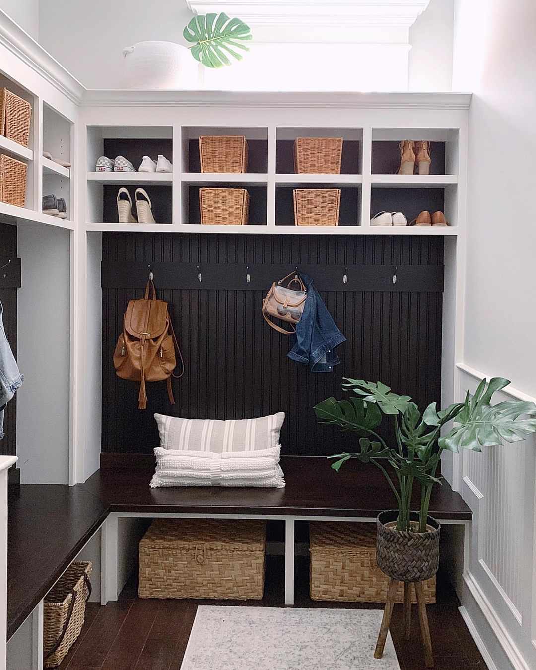 A mudroom with cubbies for storing shoes