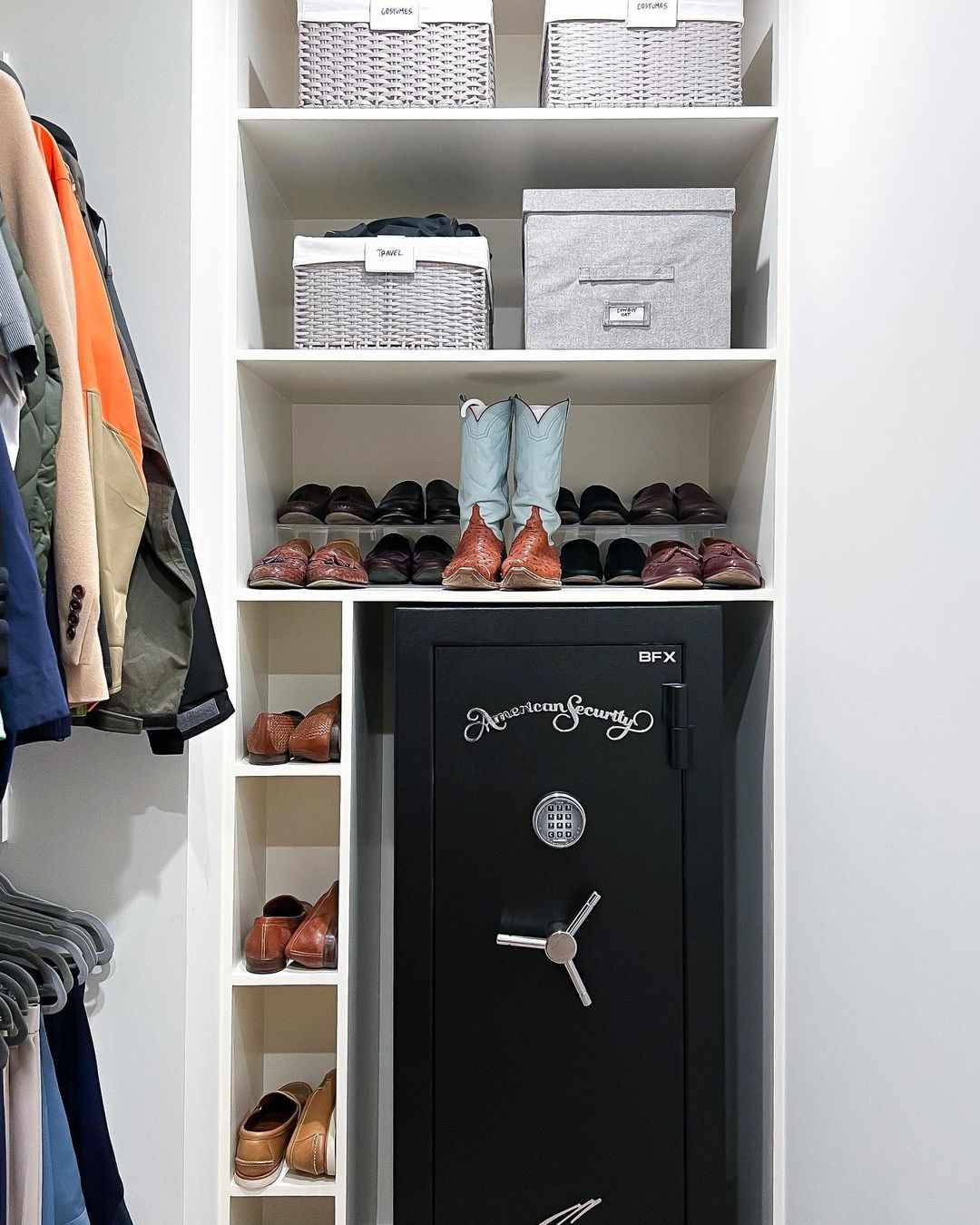 Shoe cubbies built around a safe in a closet