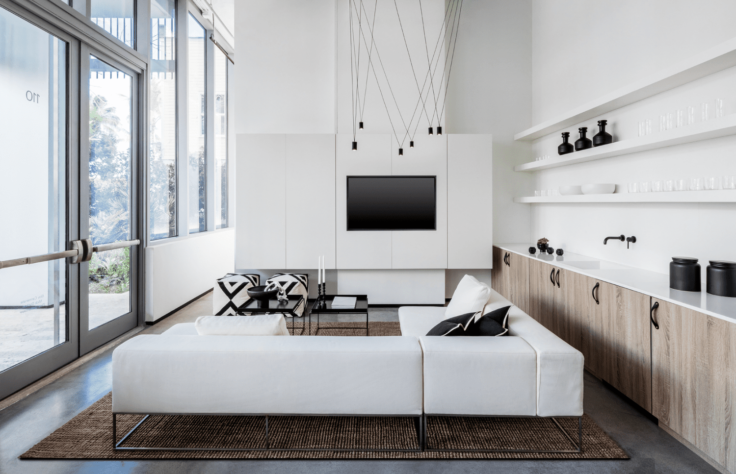 industrial lighting and wood with metallic touches in living room