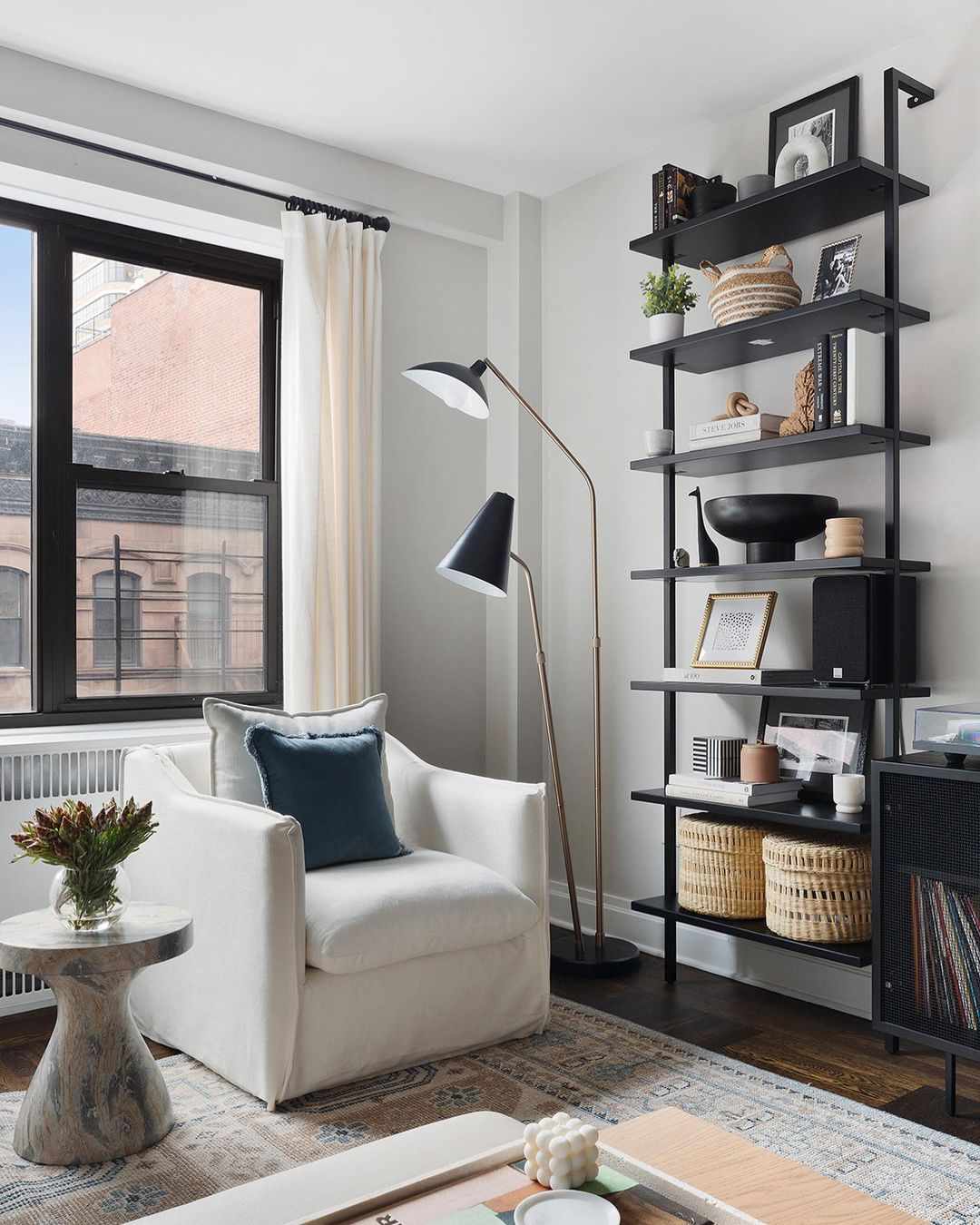 industrial shelving and lamp in apartment