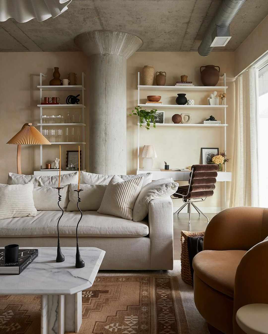 loft style apartment with exposed ductwork