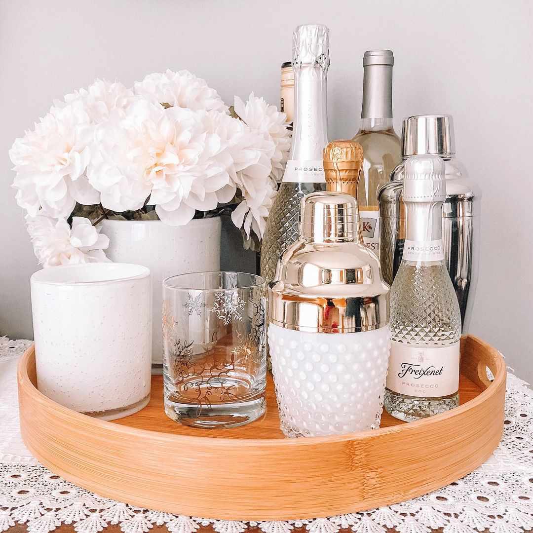 tray with bottles and flowers