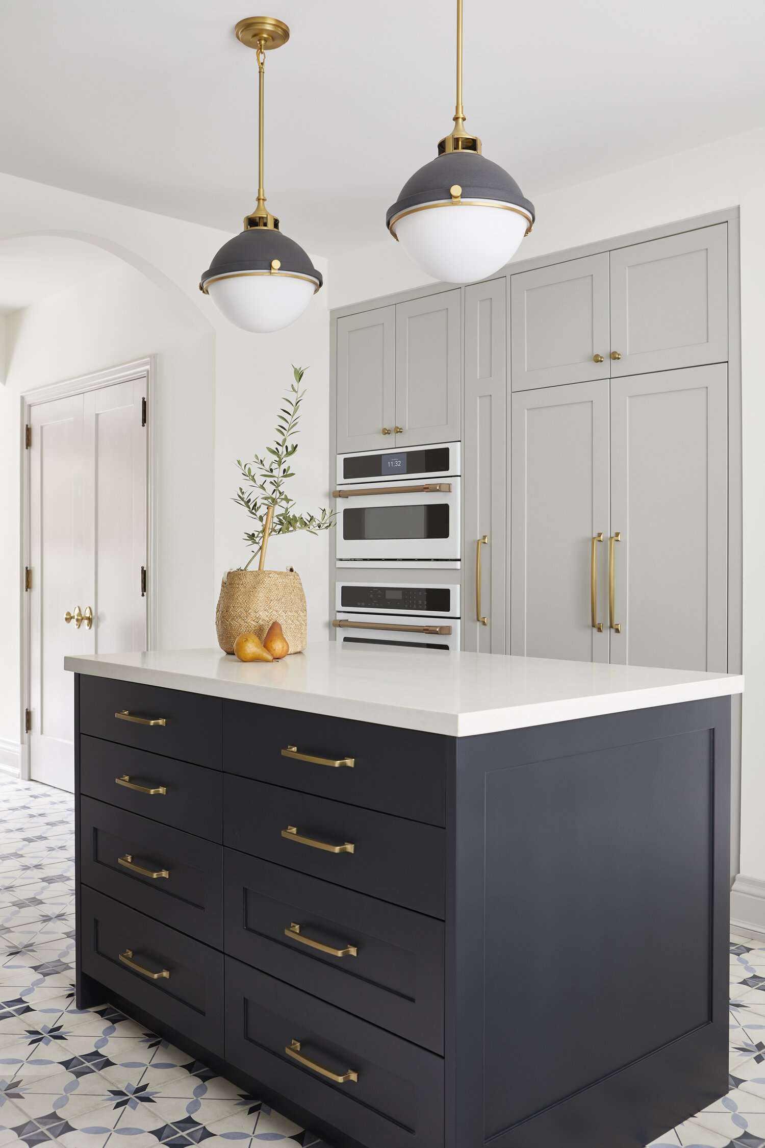 gray kitchen with navy accents