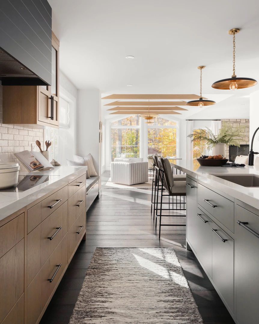 Kitchen with living room in the background