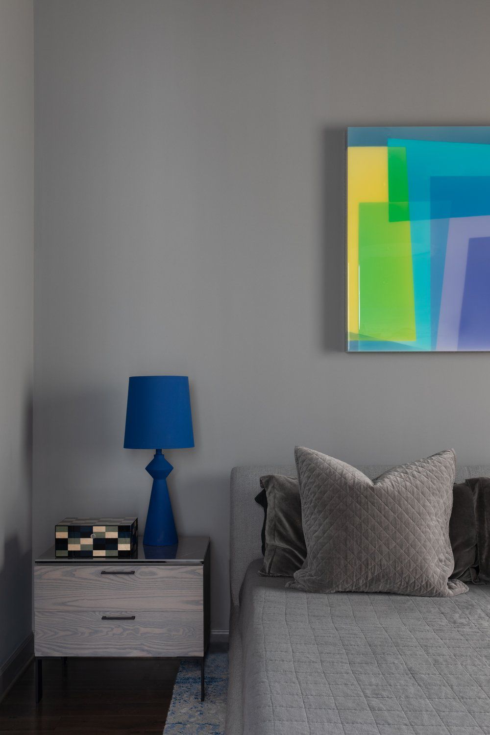 decorating with abstract art over the bed