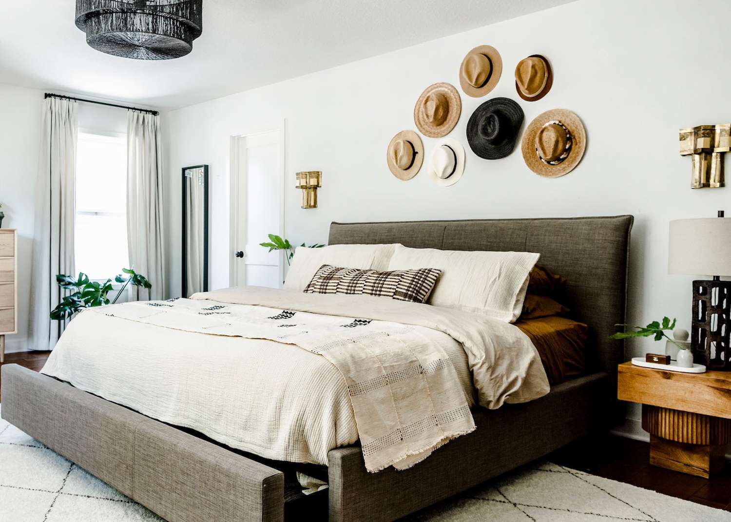 decorating with a hat display over the bed