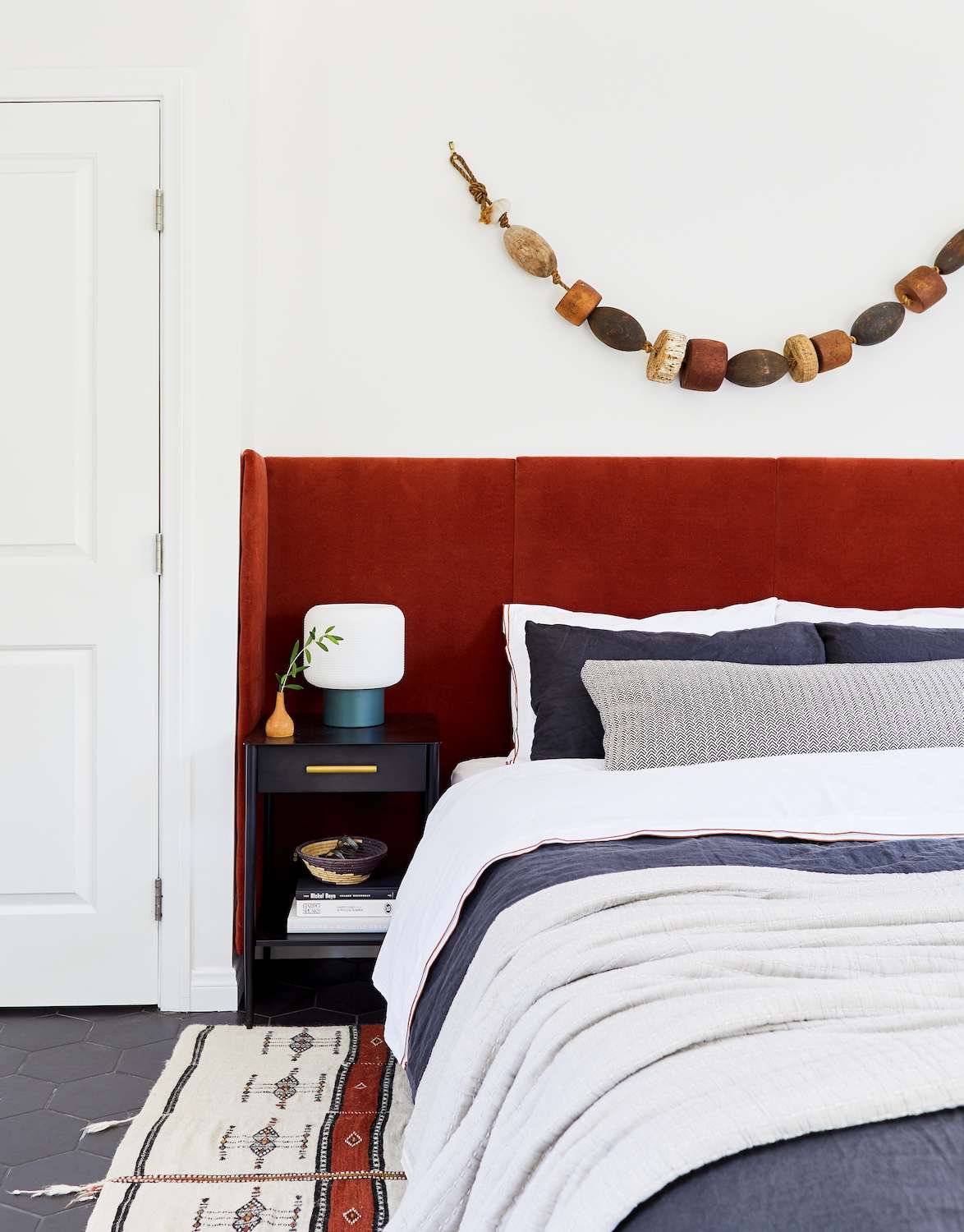 decorating with vintage beads over the bed