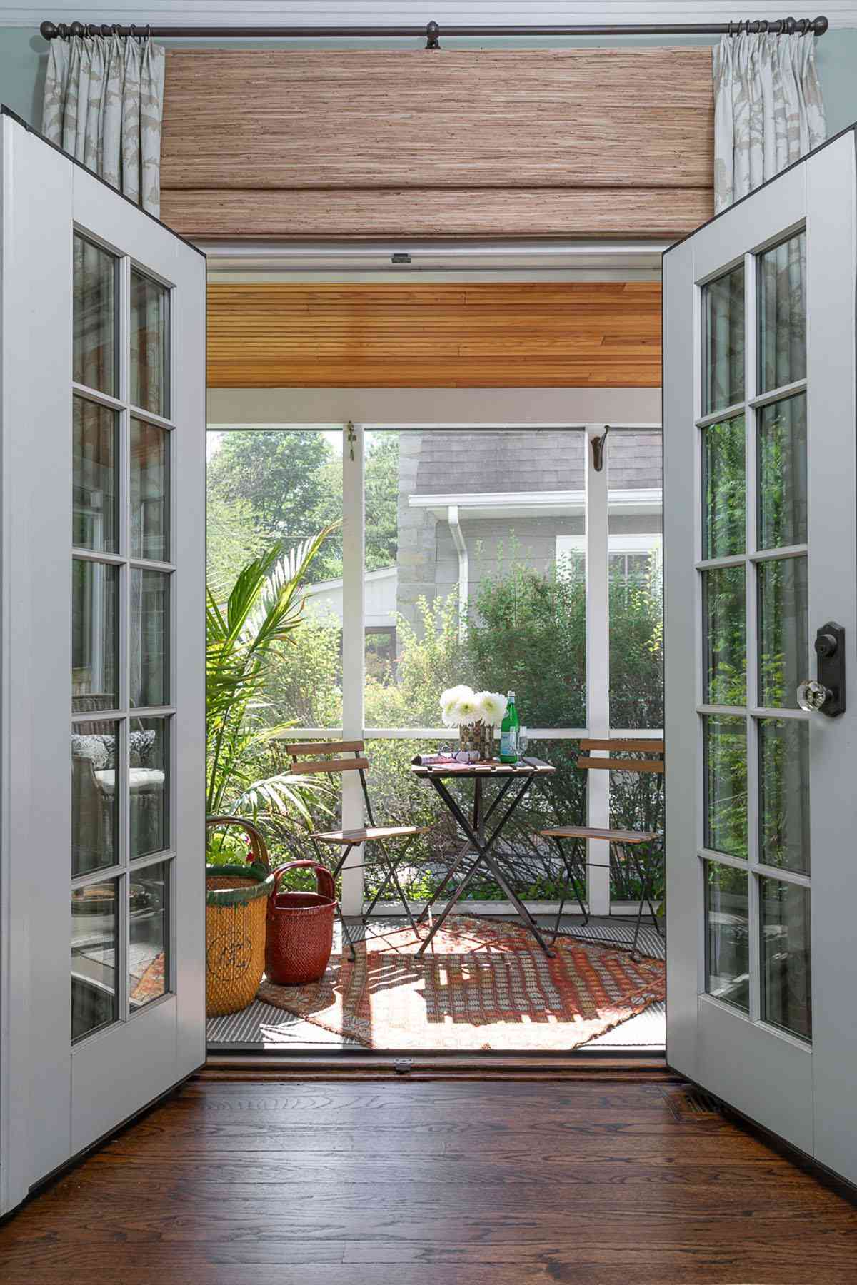 small sunroom with table and chairs