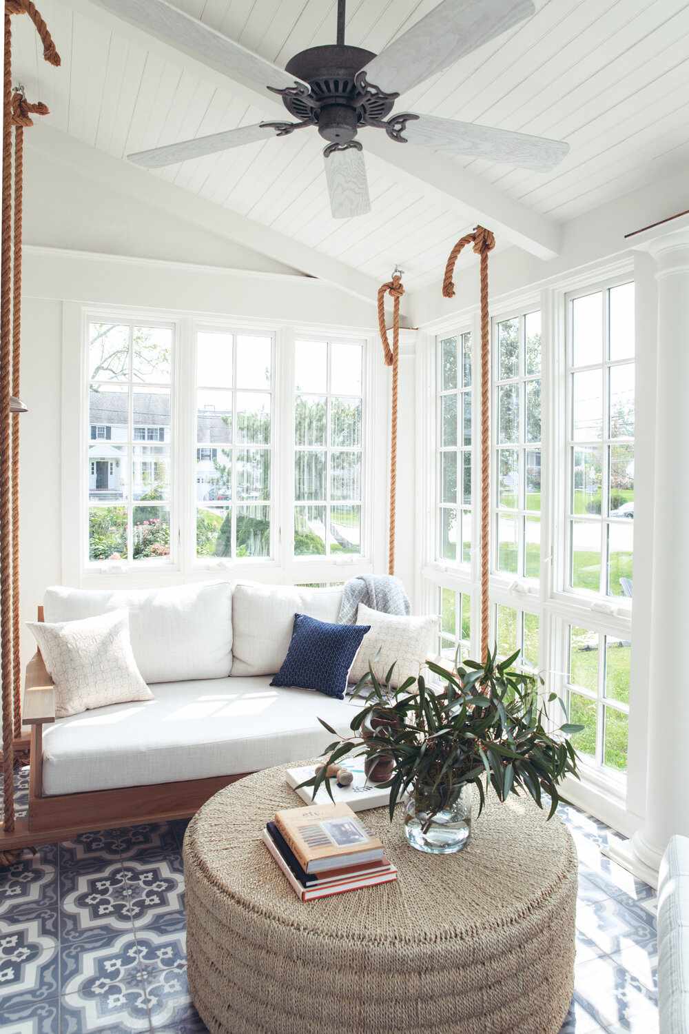 sunroom with hanging seat