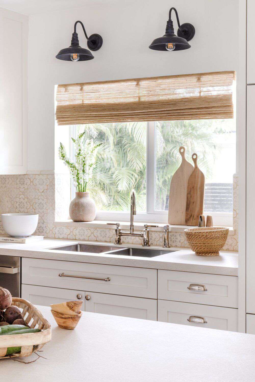 gooseneck sconce over kitchen sink