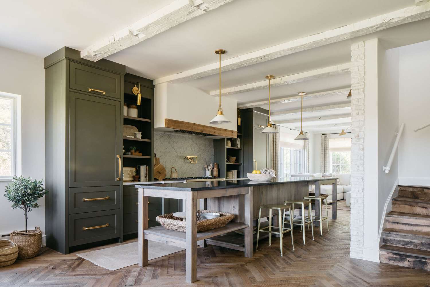 Open kitchen with living room in the background