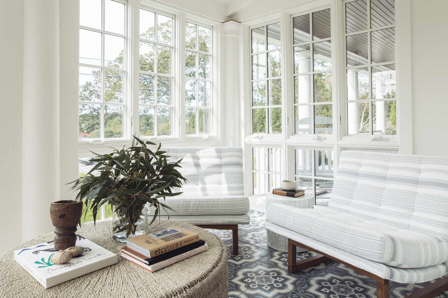 sunroom with patterned tile floor