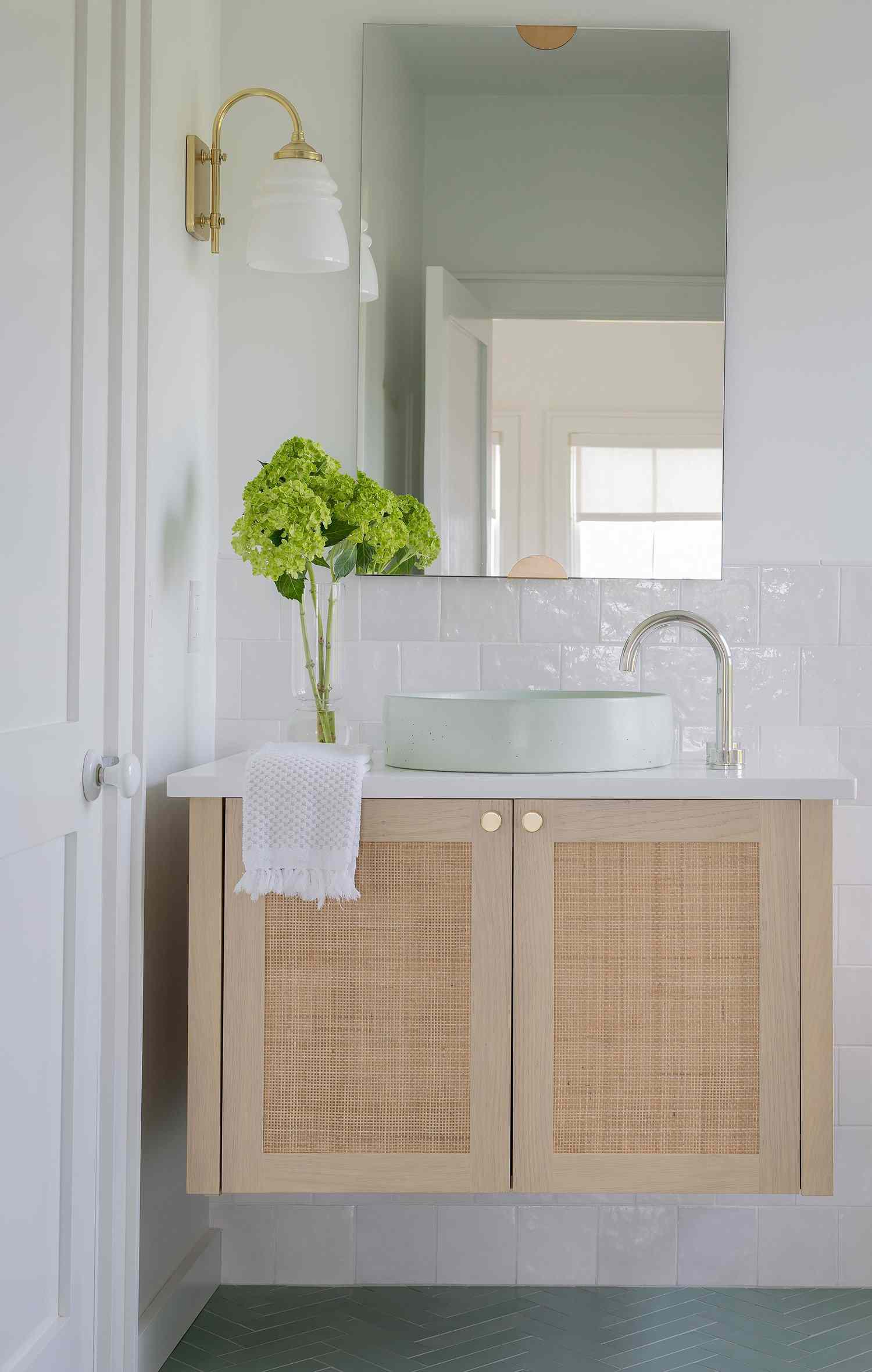 Desiree Burns Interiors view of vanity and basin sink from doorway.