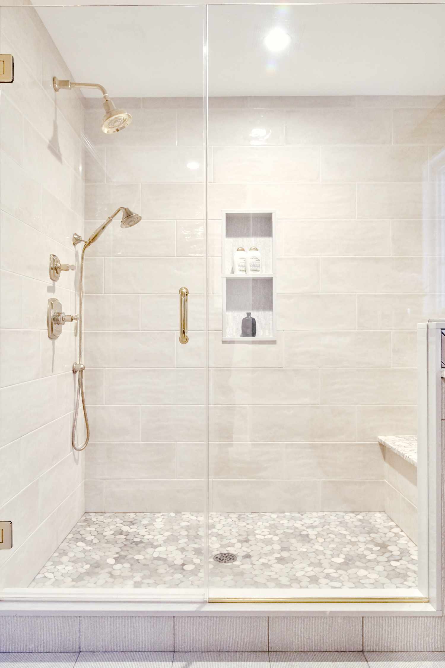 shower with brass hardware