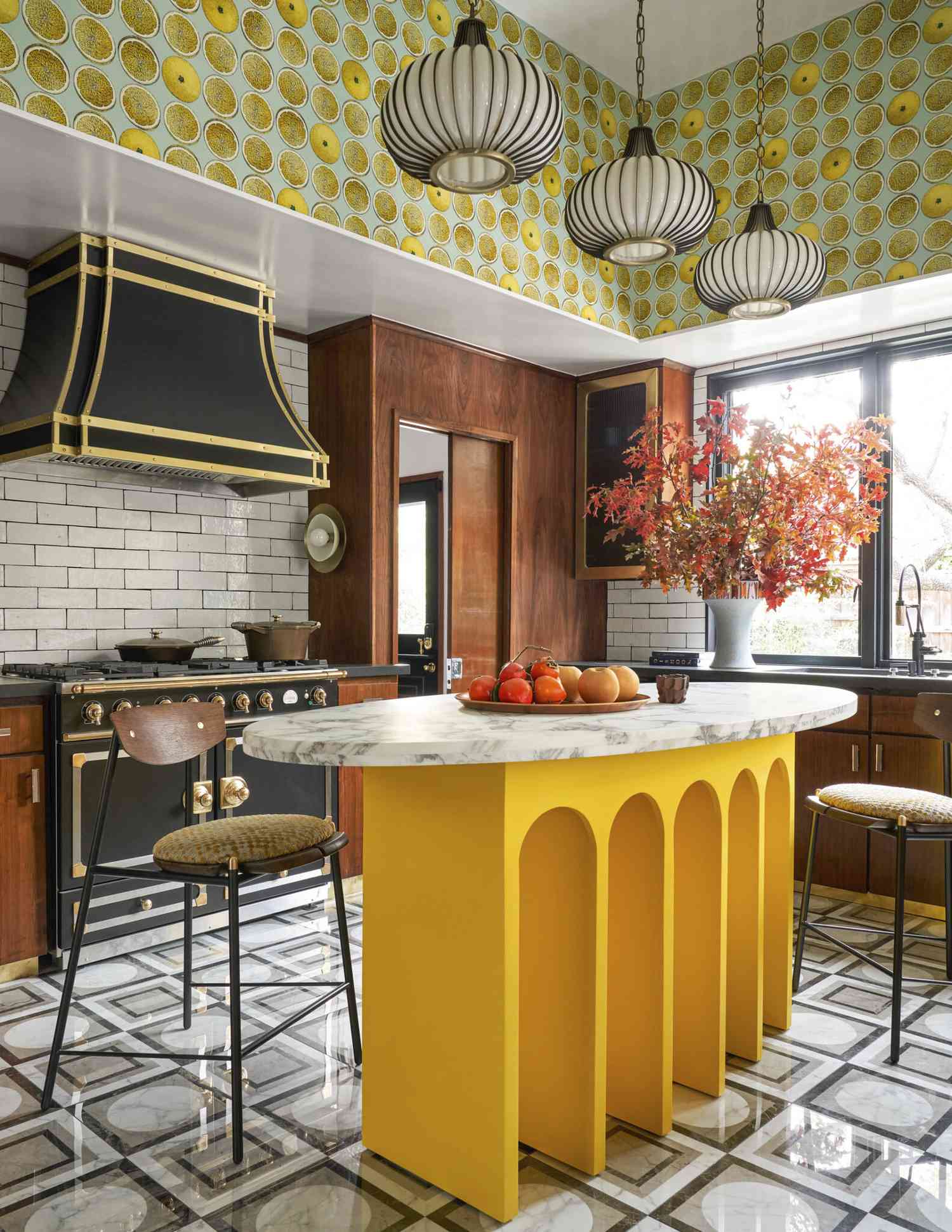 eclectic kitchen with colorful oval shaped island